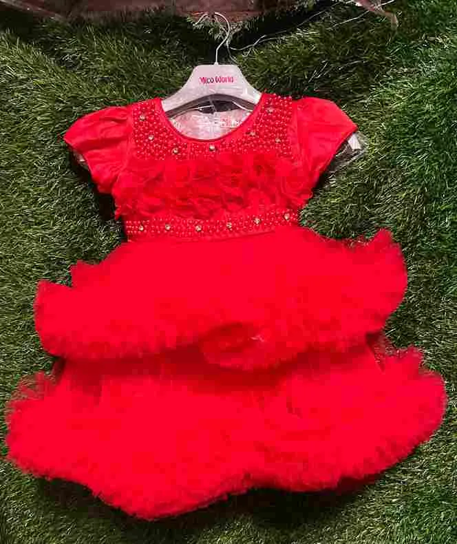 Red layered tulle gown with gold bead neckline, rhinestone waistband and ruffled skirt