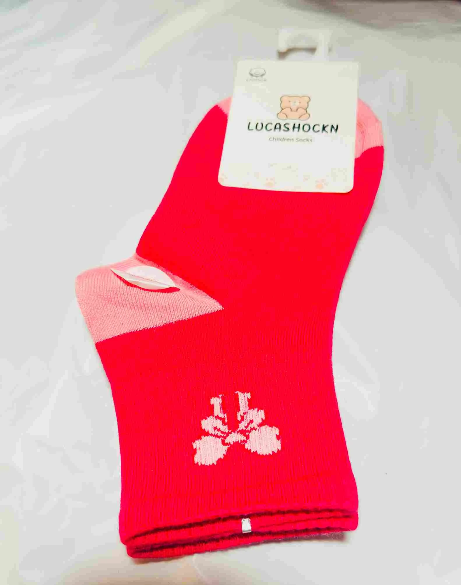 Red Lucashockn children's socks with logo